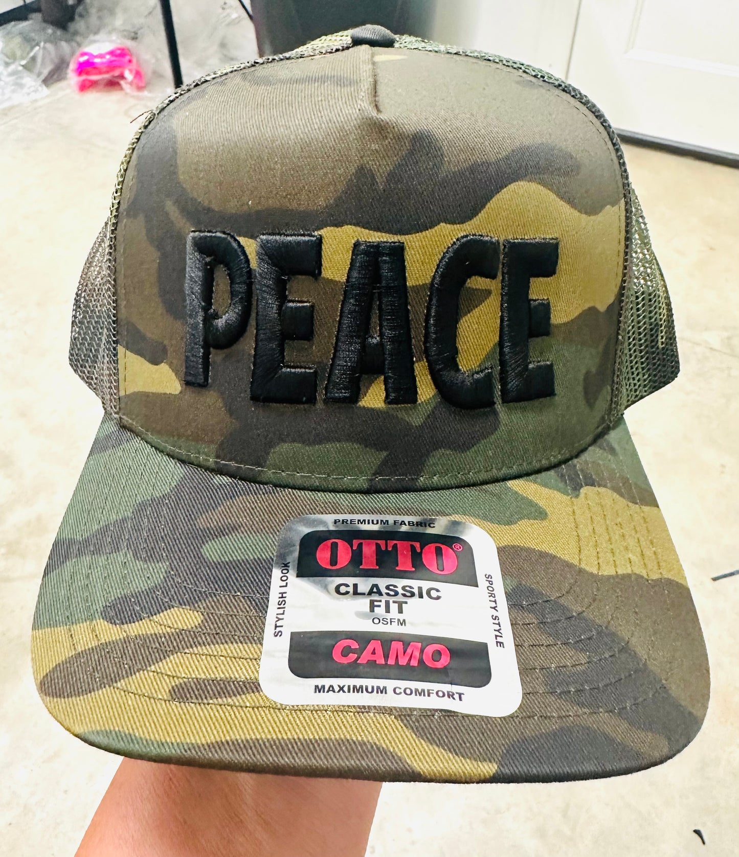 PEACE PUFF EMBROIDERY - UNISEX TRUCKER HAT