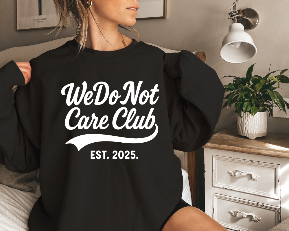 WE DO NOT CARE CLUB -UNISEX GRAPHIC SWEATSHIRT