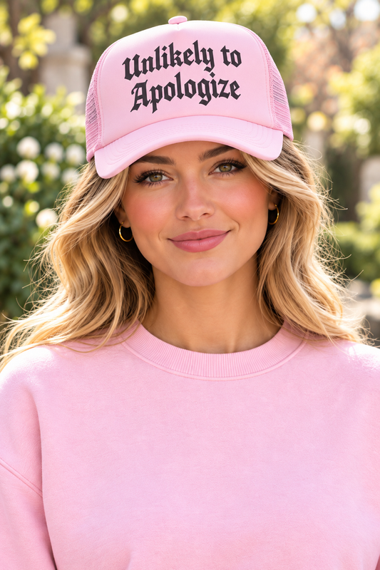 UNLIKELY TO APOLOGIZE- Light Pink Unisex Foam Trucker Hat
