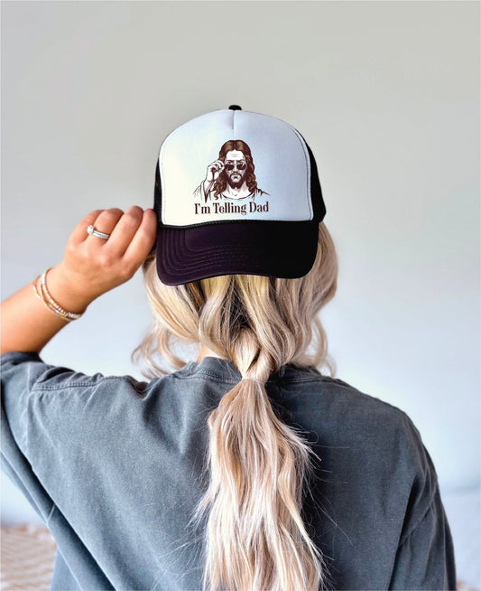 I’m Telling Dad Black & White Trucker Hat
