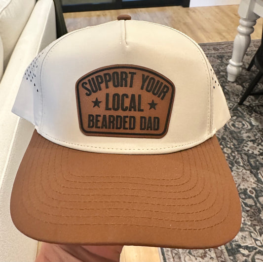 Support Your Local Bearded Dad Leather Patch on Natural and Brown hat
