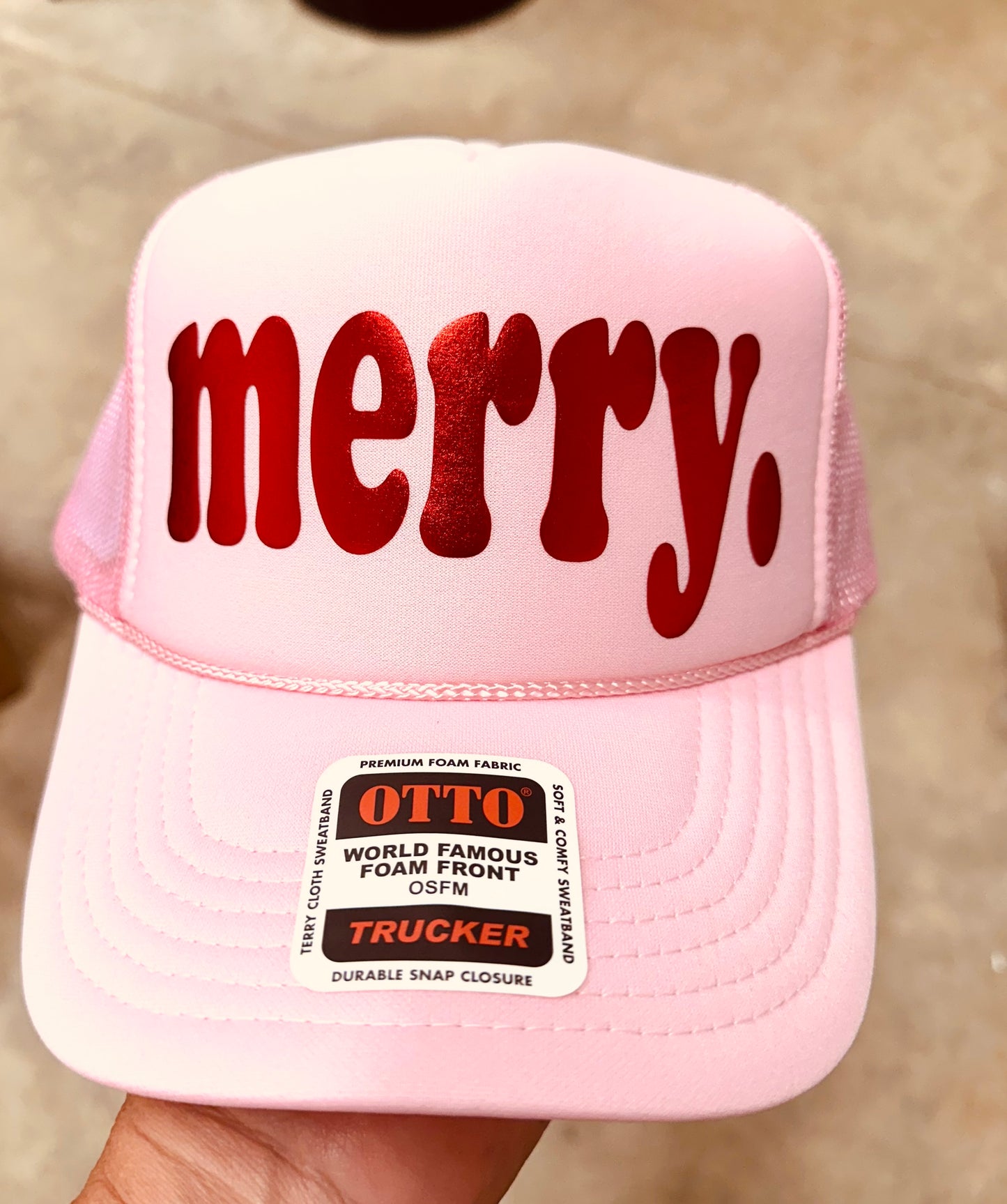 merry. 3D metallic red Puff Vinyl on a Light Pink Unisex Foam Trucker Hat