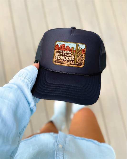 The World Needs More Cowboys- Black Otto Foam Trucker Hat